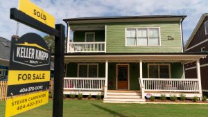 Mortgage rates rise for third straight week, hover near 7%