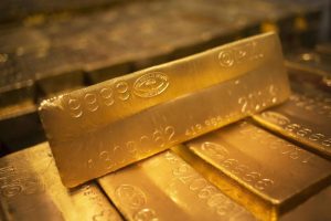 Gold prices retreat from $2,000 peak after US economic data