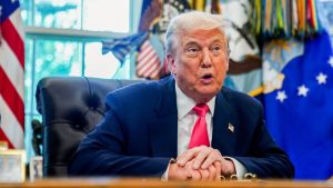 Trump calls for Fed governor’s resignation as ally requests DOJ probe