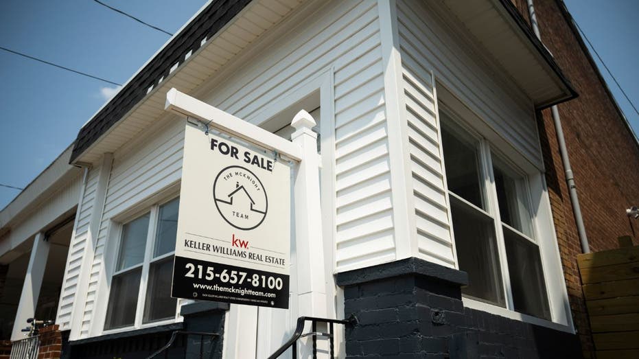 A "for sale" sign on a house in Philadelphia, Pennsylvania, on Friday, Aug. 16, 2024.
