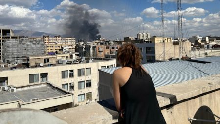 Inside Tehran: an eerie quiet is punctuated by explosions and people fleeing